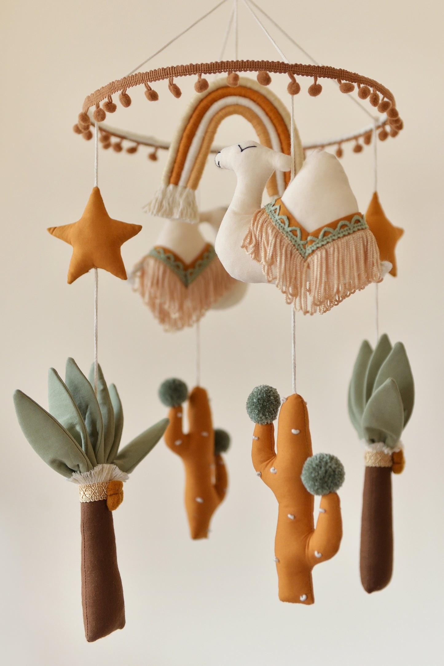 Desert Rainbow Nursery Mobile in Ochre