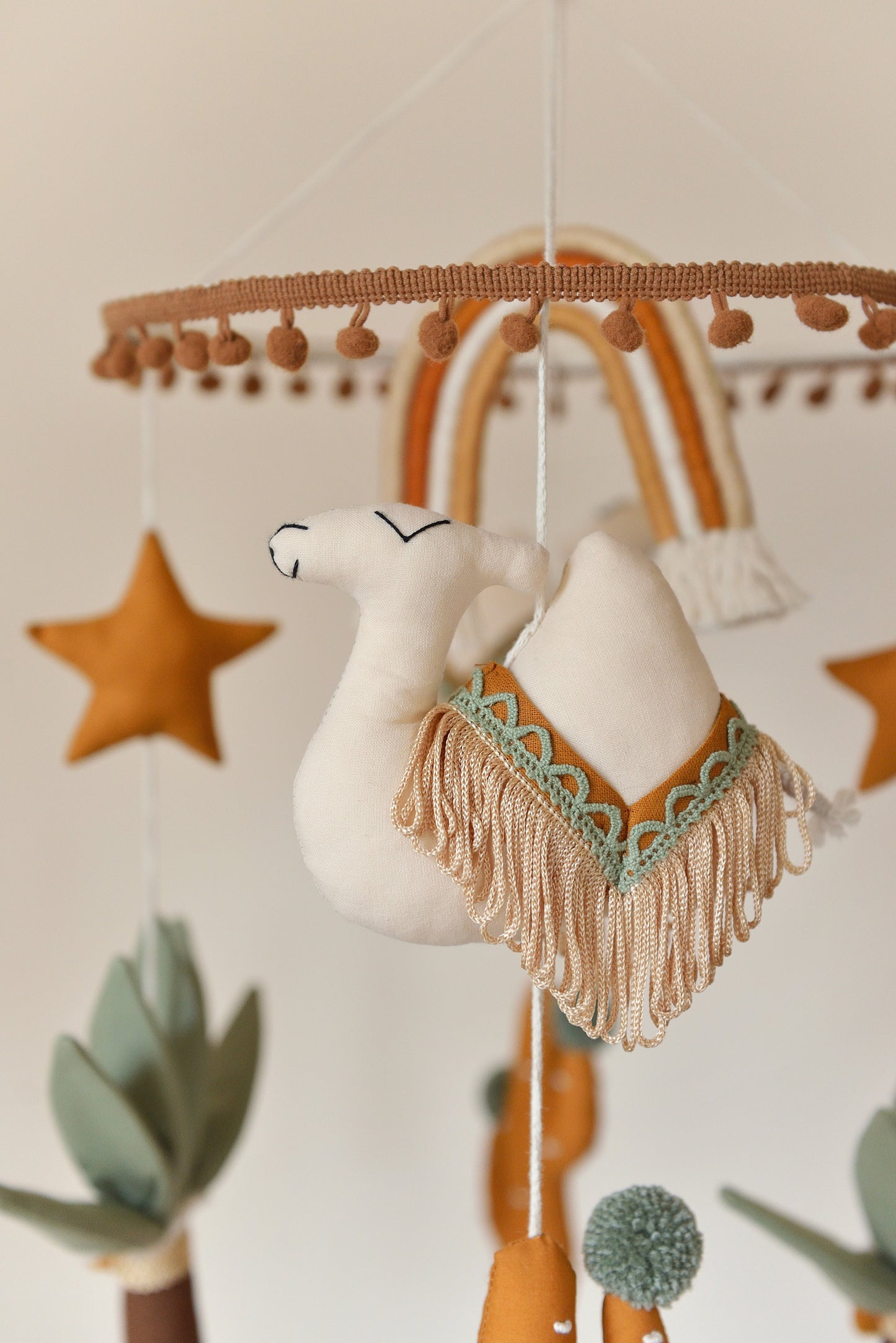 Desert Rainbow Nursery Mobile in Ochre
