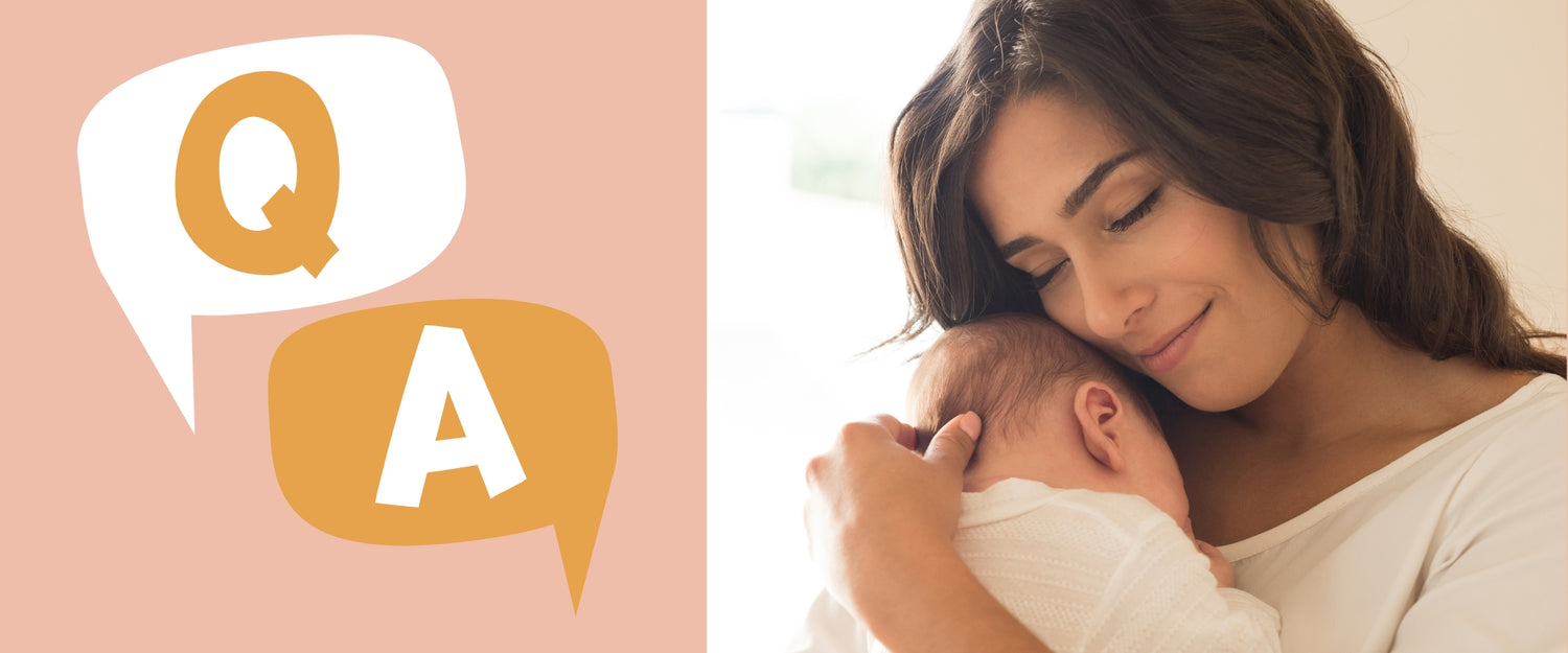 Woman holding a baby with 'Q&A' text on a light pink background