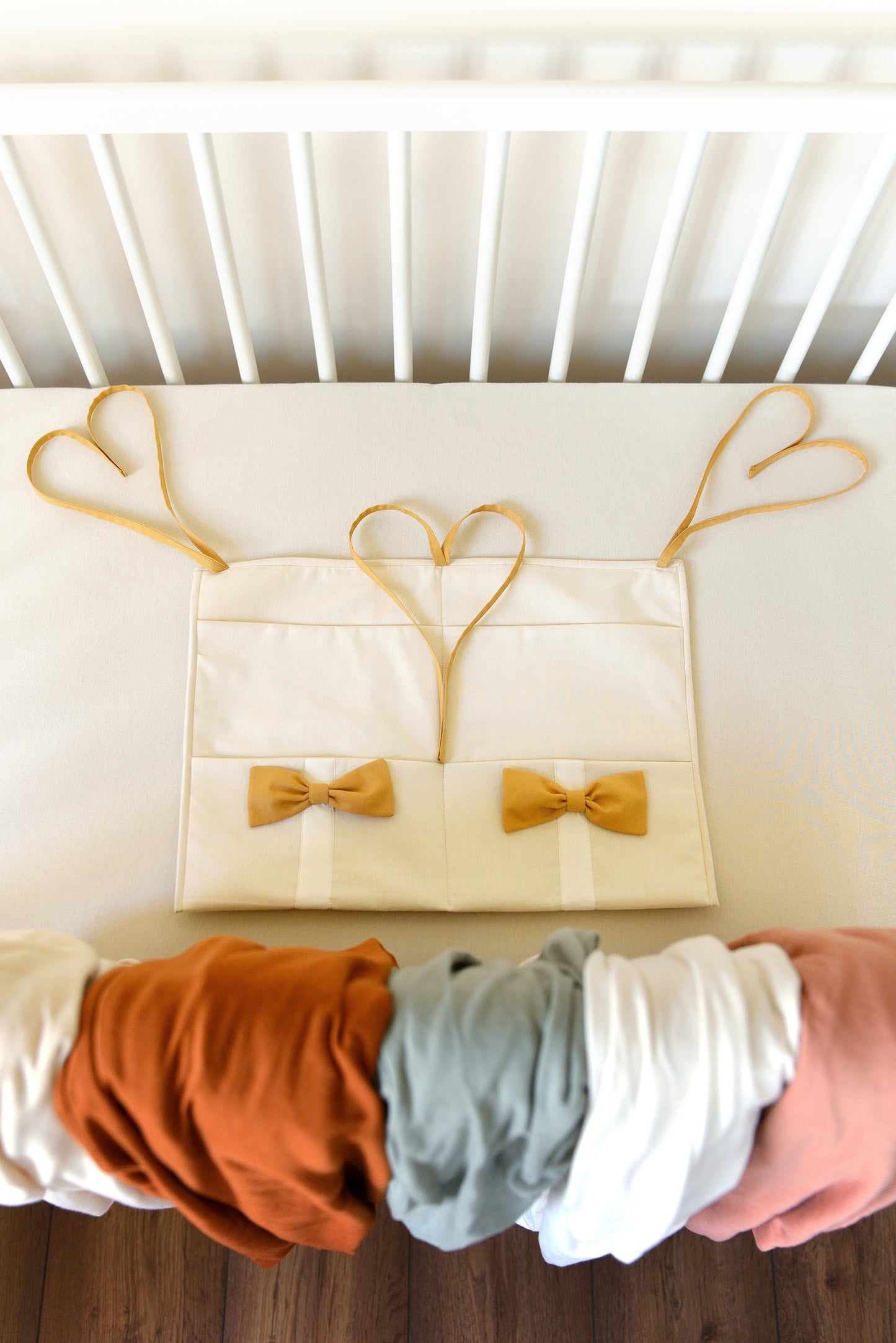 Ivory Hanging Crib Organizer With Decorative Bows