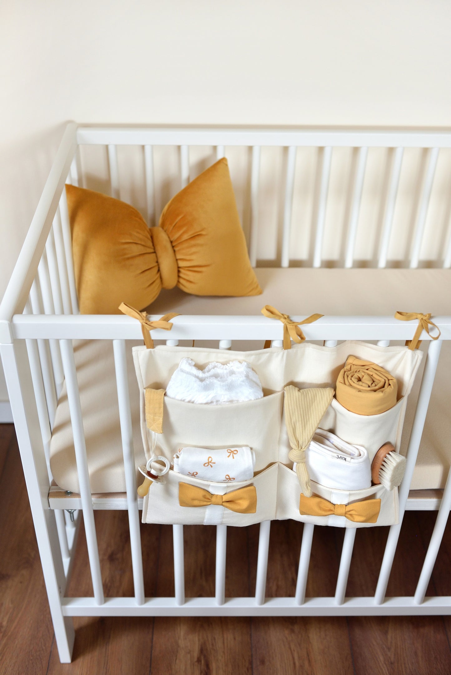 Ivory Hanging Crib Organizer With Decorative Bows