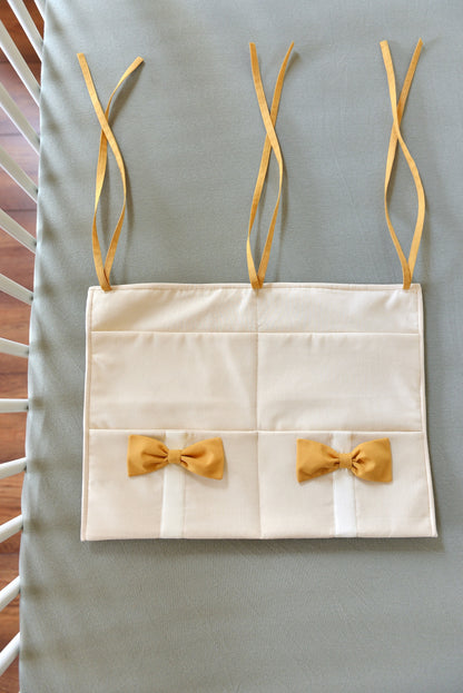 Ivory Hanging Crib Organizer With Decorative Bows