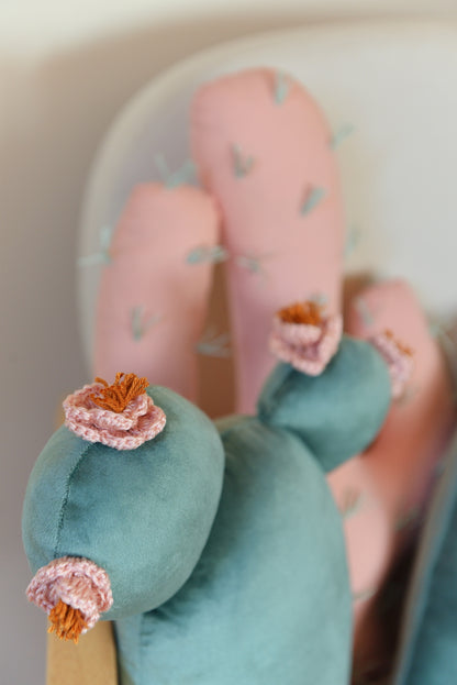 Closeup of prickly pear shaped decor pillow.